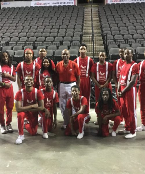 Image of Jesse White with group of tumblers
